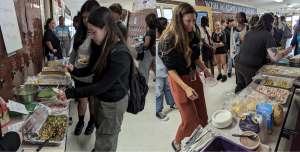 Students and staff enjoy WISH Academy's Hispanic Heritage Month Potluck in October
